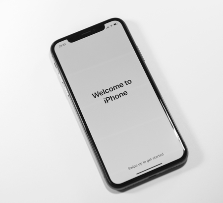 PARIS, FRANCE - NOV 3, 2017: Welcome to Apple iPhone X 10 message on the latest smartphone from Apple Computersのeditorial素材