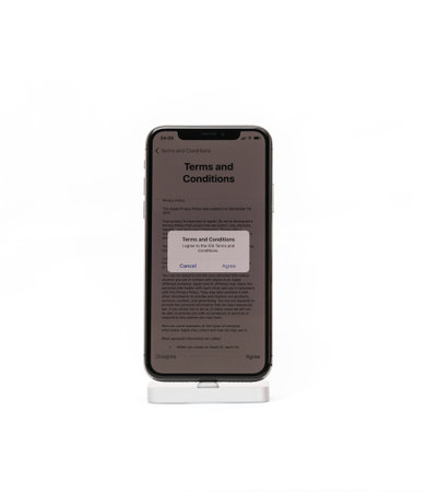 PARIS, FRANCE - NOV 5, 2017: New Apple iPhone X 10 smartphone isolated white background Terms and...