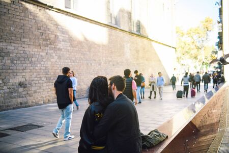 BARCELONA, SPAIN - NOV 12, 2017: Couple in love hugging near the Fossar de les Moreres monument adjacent to the basilica of Santa Maria del Marのeditorial素材