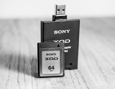 PARIS, FRANCE - MAR 26, 2017: New XQD data memory card and reader made by SONY used in Nikon and...