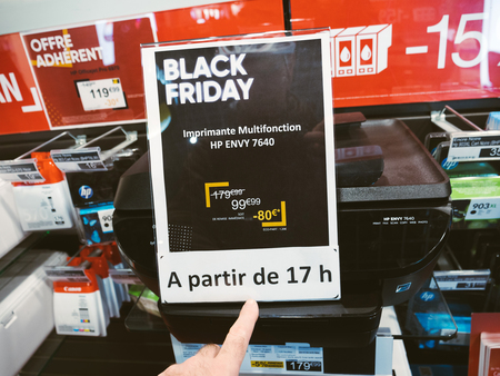 PARIS, FRANCE - NOV 23, 2017: Black Friday store shopping day in France, Paris with customers people buying electronics gadget in Fnac retail chain - man pointing to HP printerのeditorial素材