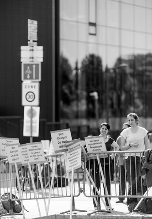 STRASBOURG, FRANCE - JUN 3, 2015: People protesting at European Court of Human Rights ECHR during grand chamber hearing conc rejection made by Turkish Alevis that state cover the expenses of cemevisのeditorial素材