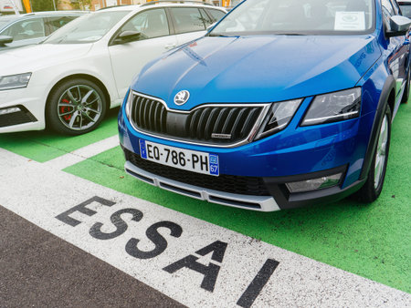 PARIS, FRANCE - NOV 7, 2017: Essai text translated as Test Drive cars with Skoda Superb and Octavia cars made by Volkswagen at the car dealership garageのeditorial素材