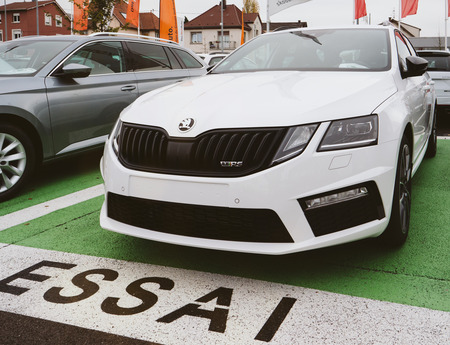 PARIS, FRANCE - NOV 7, 2017: Essai text translated as Test Drive cars with Skoda Superb and Octavia cars made by Volkswagen at the car dealership garageのeditorial素材