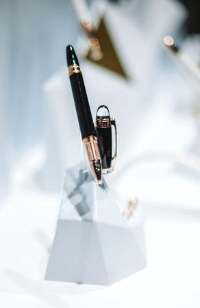 STRASBOURG, FRANCE - DEC 23, 2016: Luxury golden fountain pen in the Montblanc store in France during Christmas holiday showcase viewのeditorial素材