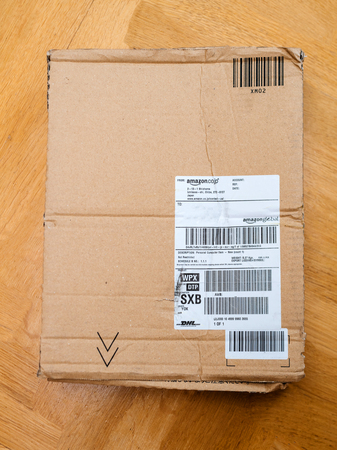 PARIS, FRANCE - APR 9, 2017: Cardboard box from Amazon.co.jp with address of the Amazon Japan headquarterのeditorial素材