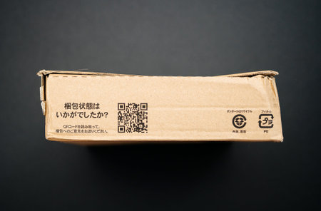 PARIS, FRANCE - APR 9, 2017: View from above of cardboard box from Amazon.co.jp with distinct online...