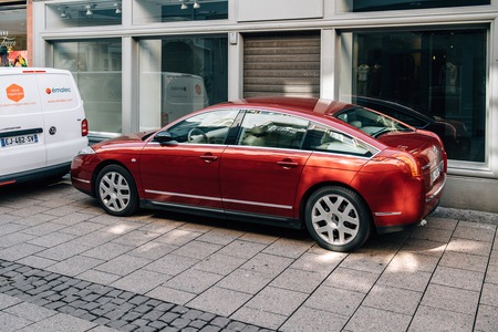 STRASBOURG, FRANCE - APR 21, 2017: Luxury red Citroen C6 luxury limousine on a French streetのeditorial素材