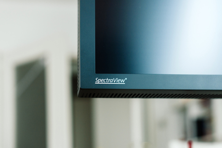 PARIS, FRANCE - JAN 9, 2017: Detail of professional Nec Spectraview Reference 322UHD 4k wide gamut monitor in a photostudio environmentのeditorial素材