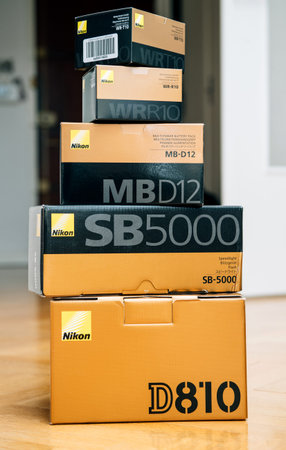 PARIS, FRANCE - FEB 21, 2018: Stack of multiple Nikon Photographic equipment camera - D810 DSLR, SB...