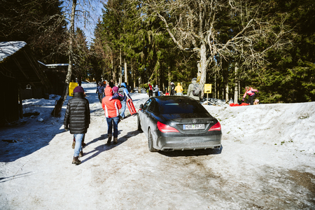 SEEBACH MUMMELSEE, FEB 25, 2018: Luxury Mercedes-Benz CLA45 AMG parked on a sledding slope in Black Forest, Germanyのeditorial素材