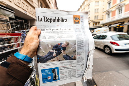 PARIS, FRANCE - MAR 15, 2018: Italian La Republica newspaper with portrait of Stephen Hawking the English theoretical physicist, cosmologist dead on 14 March 2018 outdoor press kioskのeditorial素材