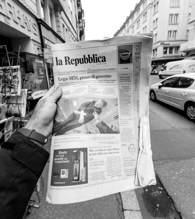 PARIS, FRANCE - MAR 15, 2018: Italian La Republica newspaper with portrait of Stephen Hawking the English theoretical physicist, cosmologist dead on 14 March 2018 outdoor press kioskのeditorial素材
