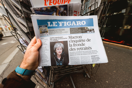 PARIS, FRANCE - MAR 15, 2018: Russia spy scandal, Theresa May targets Russians with wave of sanctions cover of the Le Figaro newspaperのeditorial素材
