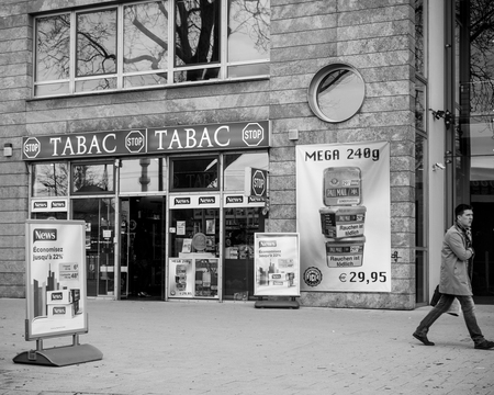 KEHL, GERMANY - MAR 29, 2018: Border shopping - German taback shop offering cheaper than in France cigarettes and tobacco in city of Kehl, Germany 4 km from Franceのeditorial素材