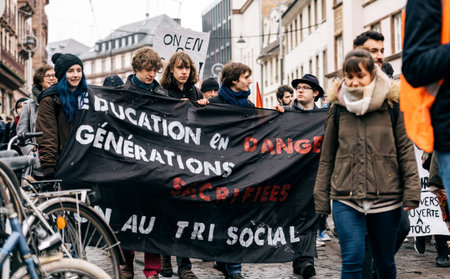 STRASBOURG, FRANCE  - MAR 22, 2018: Education generation by students with demonstration protest against Macron French government string of reforms, mutiple trade unions called public workers to strikeのeditorial素材