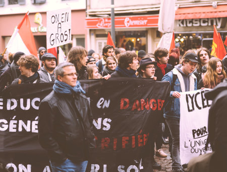 STRASBOURG, FRANCE  - MAR 22, 2018: Filter vintage over demonstration protest against Macron French...