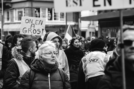 STRASBOURG, FRANCE  - MAR 22, 2018: demonstration protest against Macron French government string of reforms, mutiple trade unions called public workers to strike - black and whiteのeditorial素材