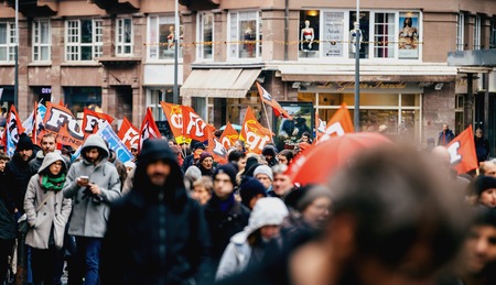 STRASBOURG, FRANCE  - MAR 22, 2018: CGT flags at demonstration protest against Macron French government string of reforms, mutiple trade unions called public workers to strikeのeditorial素材