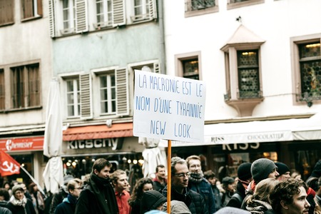 STRASBOURG, FRANCE  - MAR 22, 2018: La Macronie est le nom dun tyrannie new look - Macronie is the name of a tyranny new look on placard in in France at protest against Macronのeditorial素材