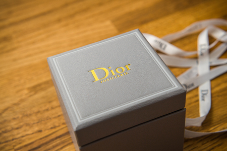 PARIS, FRANCE - JAN 2, 2018: Christian Dior haute couture jewelry box with silk band on a wooden table after unboxing of the presentのeditorial素材