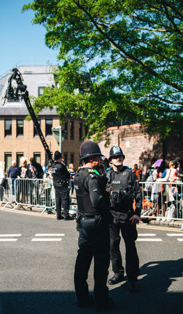 WINDSOR, UNITED KINGDOM - MAY 19, 2018: Constables police surveilling the area for royal wedding...
