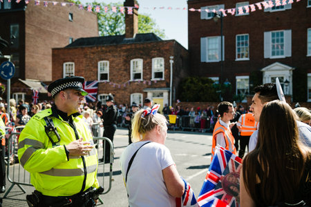 WINDSOR, UNITED KINGDOM - MAY 19, 2018: Met Police officers directing people traffic for royal wedding marriage celebration of Prince Harry, Duke of Sussex and the Duchess of Sussex Meghan Markleのeditorial素材
