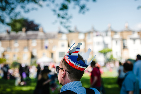 WINDSOR, BERKSHIRE, UNITED KINGDOM - MAY 19, 2018: Man wearing crown at royal wedding marriage celebration of Prince Harry, Duke of Sussex and the Duchess of Sussex Meghan Markleのeditorial素材
