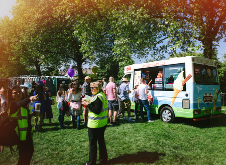 WINDSOR, BERKSHIRE, UNITED KINGDOM - MAY 19, 2018: Ice Cream van in Long Road Park at royal wedding marriage celebration of Prince Harry, Duke of Sussex and the Duchess of Sussex Meghan Markleのeditorial素材
