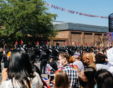 WINDSOR, UNITED KINGDOM - MAY 19, 2018: Saluting the Royal Guards march in street around Windsor Castle prior to procession celebrate wedding of Prince Harry of Wales and Ms Meghan Markleのeditorial素材
