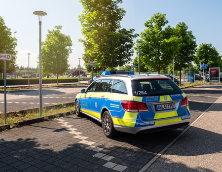 BADEN, GERMANY - MAY 11, 2018: Rear view of Polizei Police car Mercedes-Benz blue car parked in front of Karlsruhe Baden-Baden Airport (IATA: FKB, ICAO: EDSB)のeditorial素材