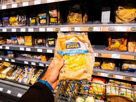 FRANKFURT, GERMANY - NOV 25, 2017: Male customer point of view buying vegan and vegetarian food in...