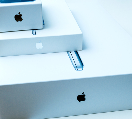 LONDON, UNITED KINGDOM - JAN 14, 2015: Side above view of new Apple MacBook Pro laptop computer with fast processors and GPU unboxing withのeditorial素材