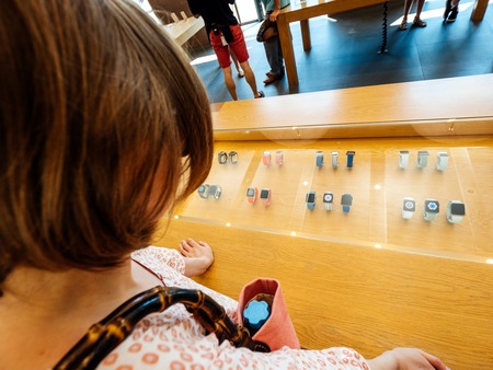 PARIS, FRANCE - JUN 30, 2018: Woman inside Apple Store deciding what Apple Watch to buyのeditorial素材