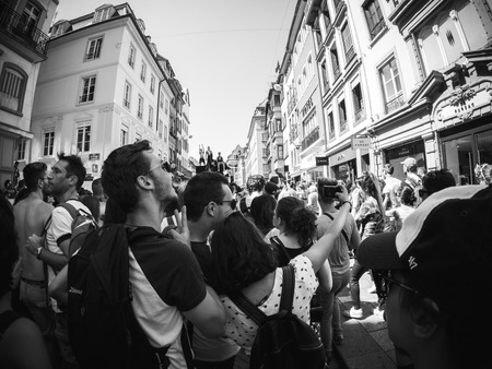 STRASBOURG, FRANCE - JUN 10, 2017: Large crowd dancing, taking photos at Lesbian Gay Bisexual Transgender LGBT visibility march pride Festigays - black and whiteのeditorial素材