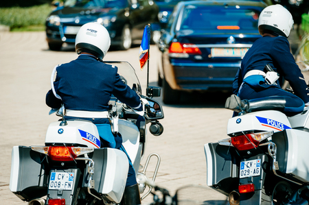 STRASBOURG, FRANCE - APR 21, 2015: Police officers convoy on motorcycles preparing to leave the European Court of human Rights in Strasbourgのeditorial素材