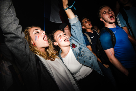 STRASBOURG, FRANCE - JULY 10, 2018: Girls celebrating on Central Place Kleber after the victory of France qualify for the final of the 2018 FIFA World Cup after their victory over Belgium 1-0のeditorial素材