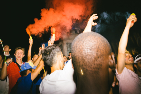 STRASBOURG, FRANCE - JULY 10, 2018: Smoke flare in Central Place Kleber after the victory of France qualify for the final of the 2018 FIFA World Cup after their victory over Belgium 1-0のeditorial素材