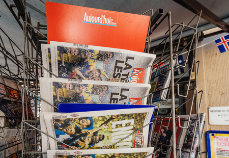 PARIS, FRANCE - JUL 16, 2018: Multiple newspaper announcing France champion title after French national football team won their FIFA World Cup 2018 final game against Croatia in Moscowのeditorial素材
