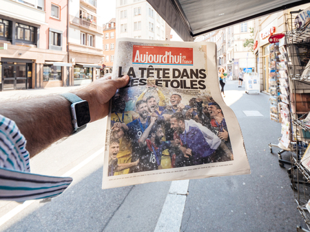 PARIS, FRANCE - JUL 16, 2018: Aujordhui newspaper announcing France champion title after French national football team won their FIFA World Cup 2018 final game against Croatia in Moscowのeditorial素材