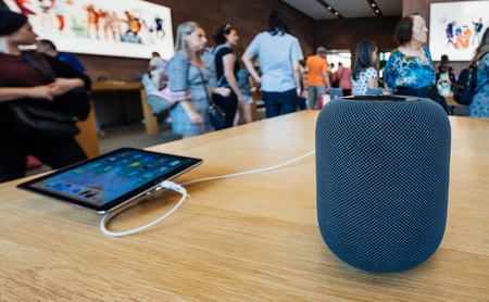 PARIS, FRANCE - JUL 16, 2018: People in Apple Store and the latest Apple Computers HomePod smart speaker with Siri and Apple Musicのeditorial素材