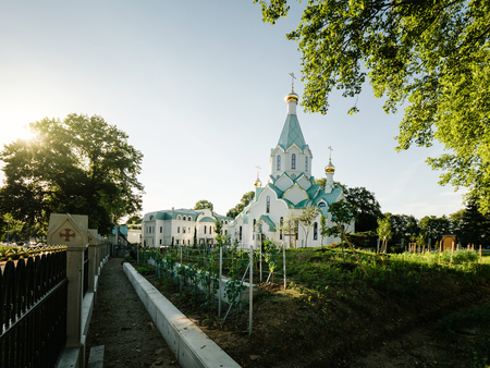 Sunset with newly constructed Russian Orthodox Church of All Saints facadeの写真素材