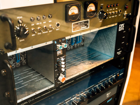 PARIS, FRANCE - JAN 30, 2018: Multiple audio equipment in recording studio from the brands as JDK...