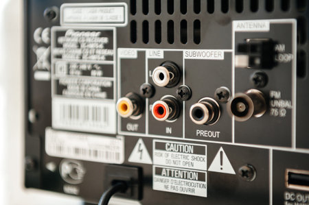 PARIS, FRANCE - FEB 18, 2013: Rear part of a power music amplifier with Subwoofer, antenna,...