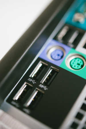 Multiple USB 3 and USB 2 ports on the rear part of a powerful workstationの写真素材