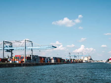 Strasbourg, France - Sep 1, 2018: View of metal freight containers on concrete seafront in sunlight in Port de Strasbourg on Rhineのeditorial素材