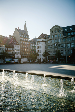 STRASBOURG, FRANCE - SEP 12, 2018: Morning Strasbourg city center with water fountain and Alsatian buildings in the backgroundのeditorial素材