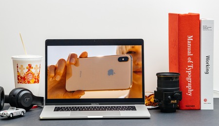 London - September 13, 2018: Apple Computers internet website on 15 inch 2018 MacBook Retina in room environment showcasing iPhone Xr capabilities in advertorialのeditorial素材