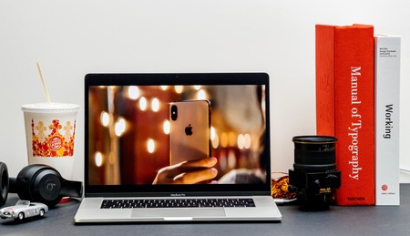 London - September 13, 2018: Apple Computers internet website on 15 inch 2018 MacBook Retina in room environment showcasing iPhone Xr capabilities in advertorialのeditorial素材