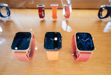 STRASBOURG, FRANCE - SEP 21, 2018: Apple Store the new latest Apple Watch Series 4 wearable personal luxury watch in pink gold new luxry devices sport trackersのeditorial素材